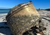 Police look for clues after mystery object washes up on beach in Australia | World News