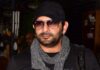 Arshad Warsi celebrates his birthday with paparazzi; WATCH as he engages in fun banter during cake-cutting
