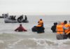 Migrants try to board small boat off French beach in desperate bid for Britain – as powerless police watch on | UK News