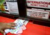 Migrant workers sent $650bn overseas last year – what it means | Migration