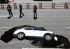 Seoul: Elderly couple injured after their car falls into sinkhole | World News