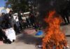 Palestinians burn ‘humiliating’ shirts after release from Israeli prisons | Israel-Palestine conflict News