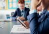 Banning phones in schools does not improve grades or mental health, new study finds | UK News