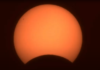 Eclipse chasers in awe as moon takes a nibble from the sun | Science, Climate & Tech News