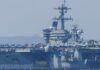 US aircraft carrier scrambles fighter jet to down ‘aggressive’ Iranian drone as tensions rise ahead of talks | US News