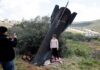 Children play around missiles as remnants of projectiles pictured across Middle East | World News