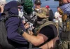 ICE agents use pepper spray on protesters outside detention centre | Police