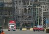 One killed and nine missing after chemical tank implodes in US