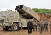 North Korea tests AI-guided missiles as Kim Jong Un looks on