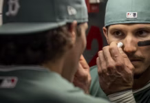 Why do baseball players put a black mark under their eyes?