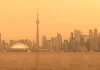 Wildfire smoke engulfs Toronto, Canada and turns its skies orange | Weather News