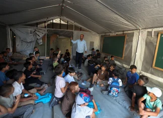 Photos: Gaza’s children return to class in tents and ruins | Gaza News