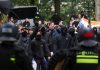 Police clash with hundreds of far-right protesters in The Hague